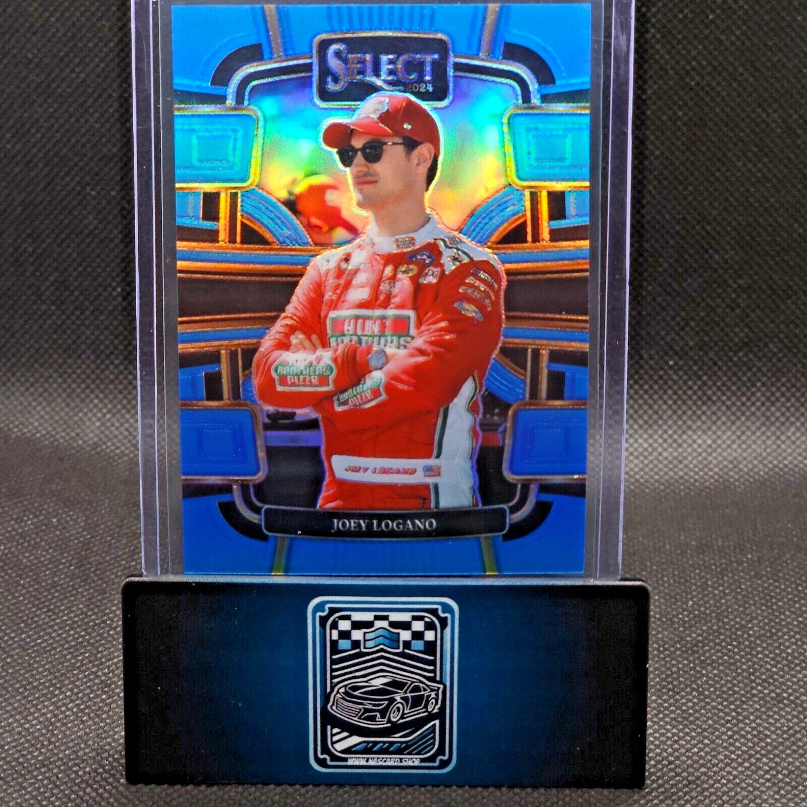 2024 Panini Select Racing Grandstand Light Blue Prizm #7 Joey Logano 174/199 - NASCARD.shop