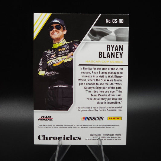 2020 Panini Chronicles - Chronicles Swatches Purple #CS-RB Ryan Blaney 25/25 - NASCARD.shop
