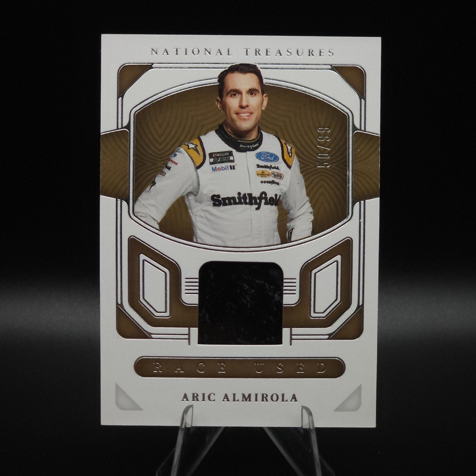 2023 Panini National Treasures - Race Used Aric Almirola #RU-AAM Sheet Metal /99 - NASCARD.shop