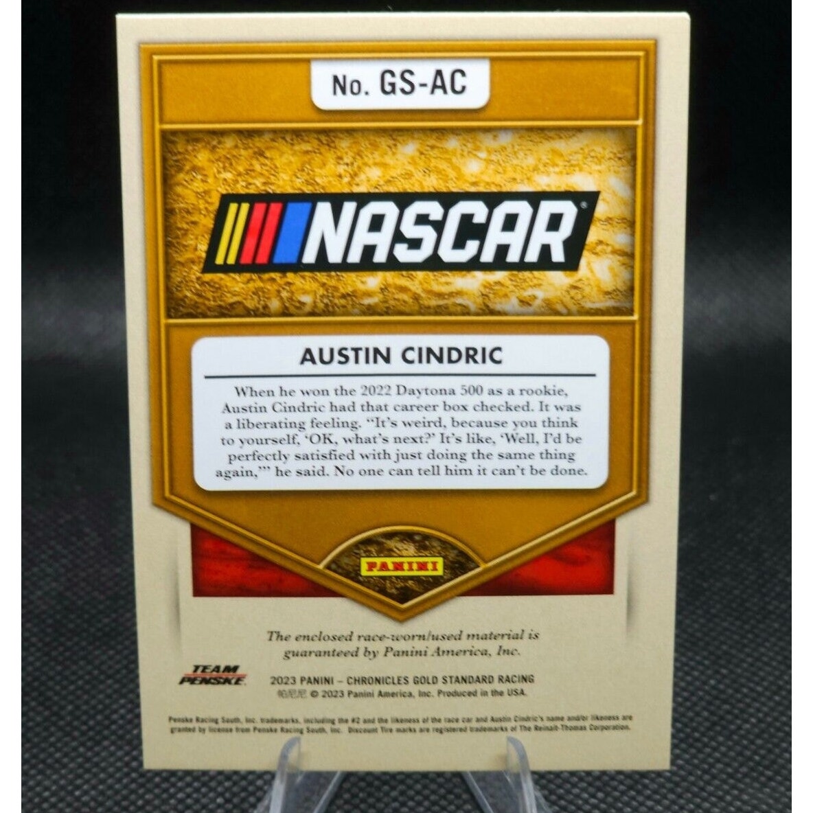 2022 Panini Chronicles Gold Standard #GS-AC Austin Cindric Race Used Memorabilia
