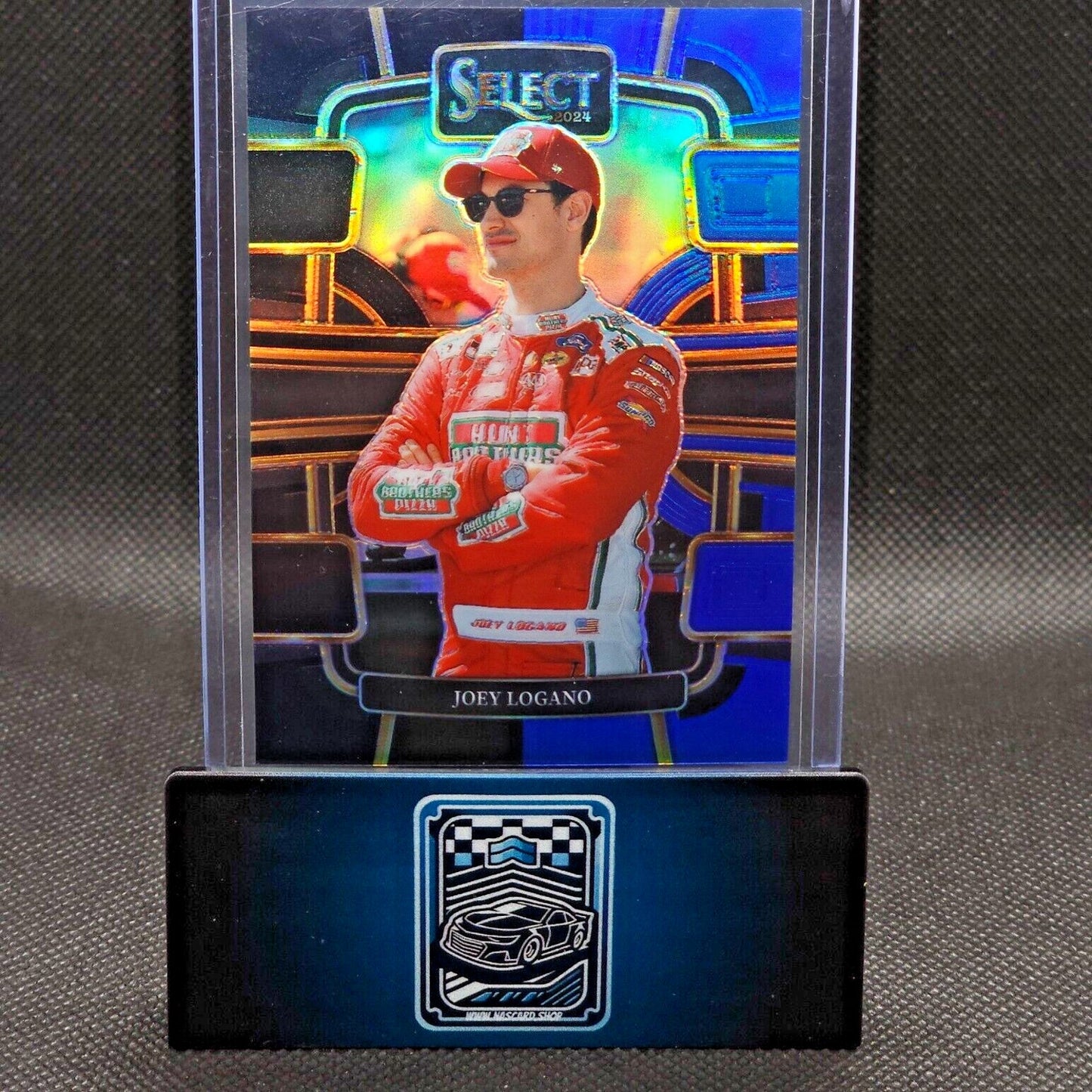 2024 Panini Select Racing Grandstand Black and Blue Prizm #7 Joey Logano 49/49