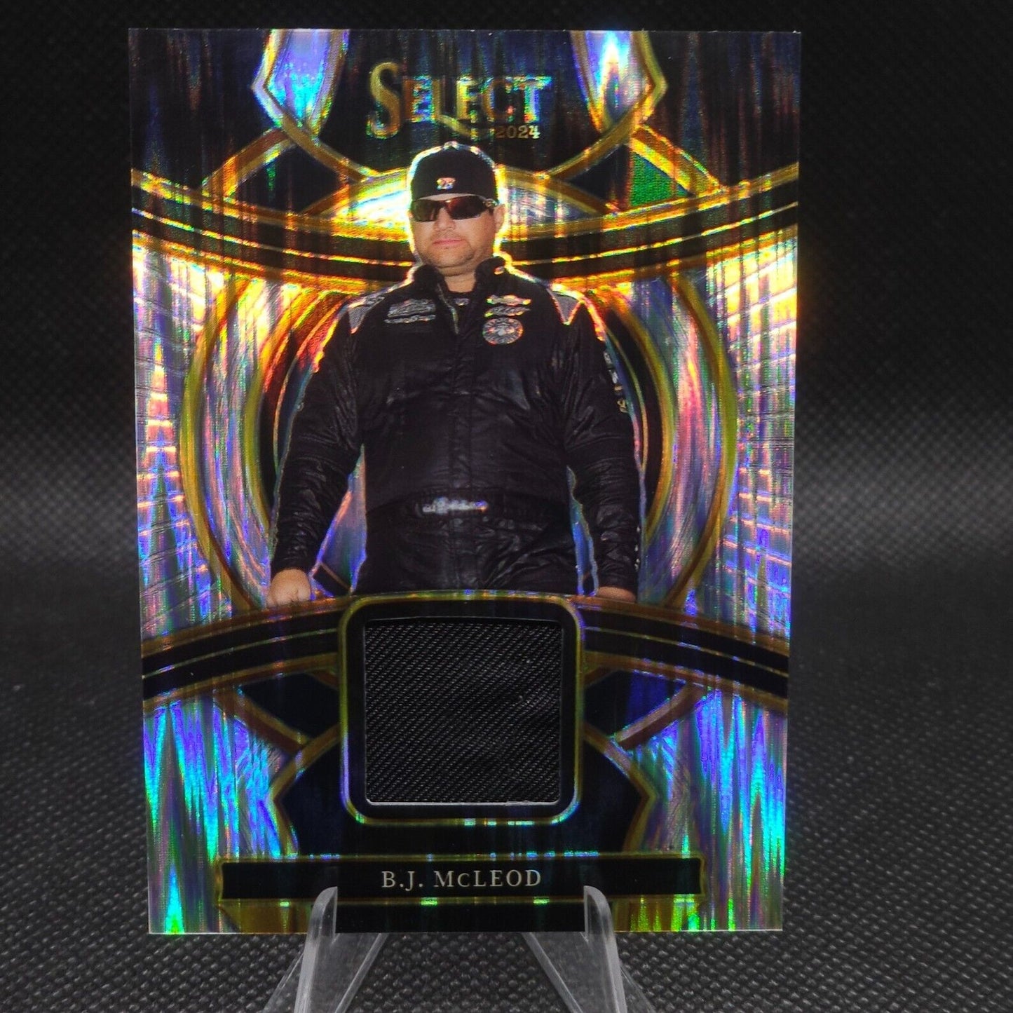 2024 Panini Select Racing Selective Swatches Flash Prizm #SS-BJM B.J. McLeod - NASCARD.shop